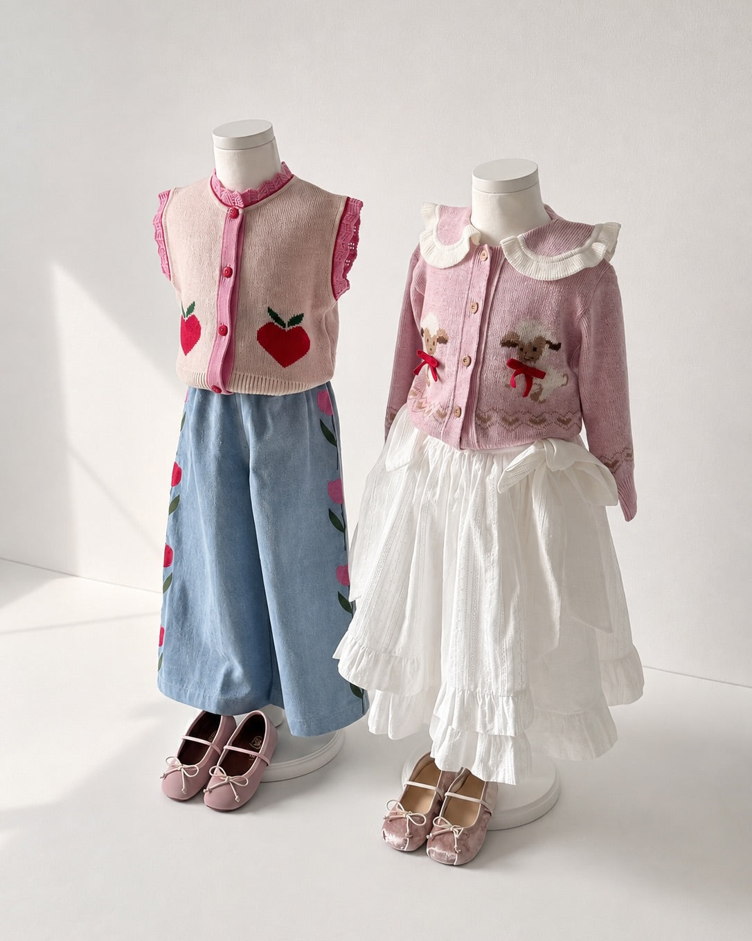 Bebe Organic Pomme Vest Love Apple Knit - kids vest worn outdoors