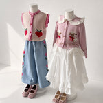 Bebe Organic Pomme Vest Love Apple Knit - kids vest worn outdoors